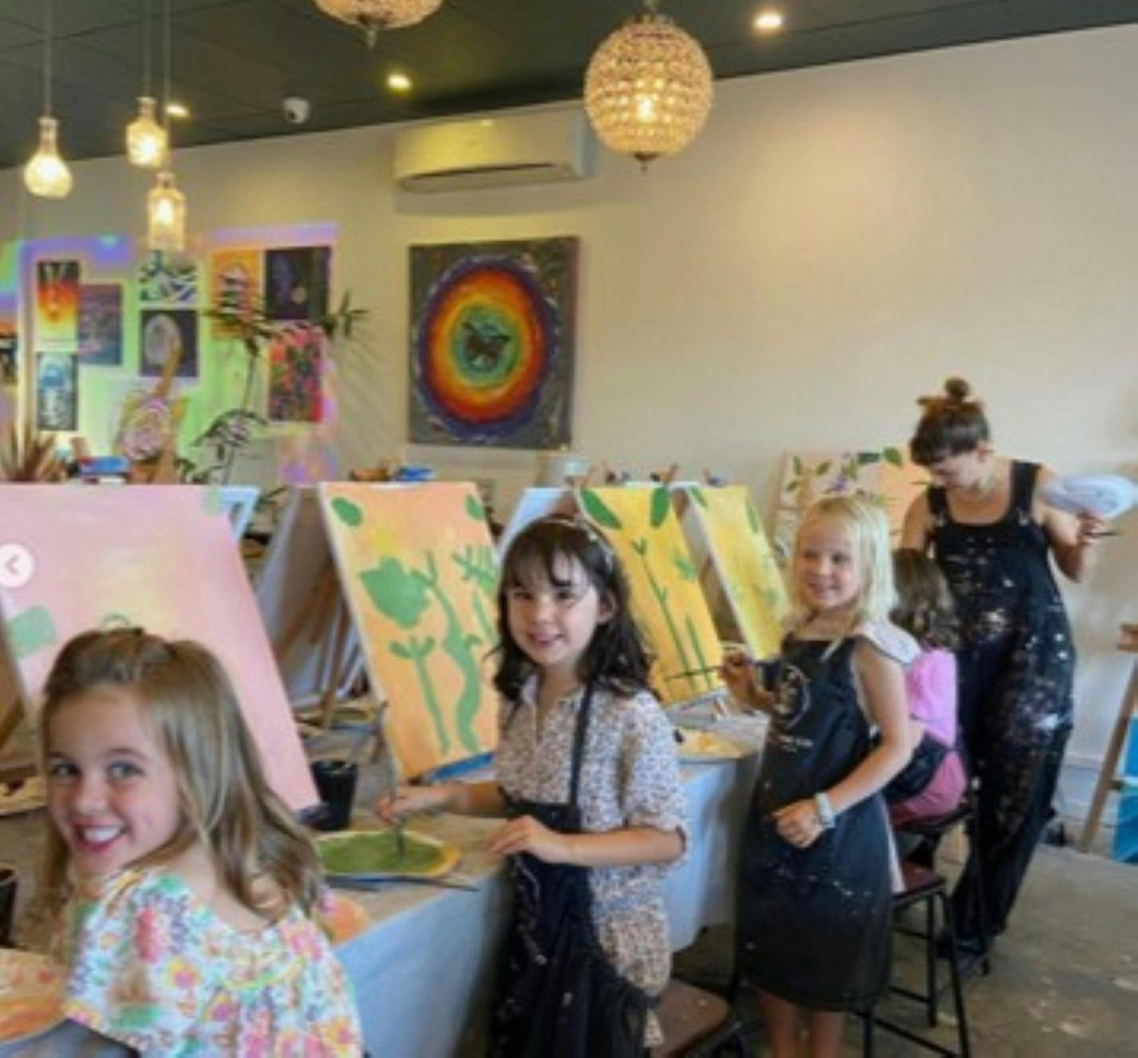 kids painting on canvas