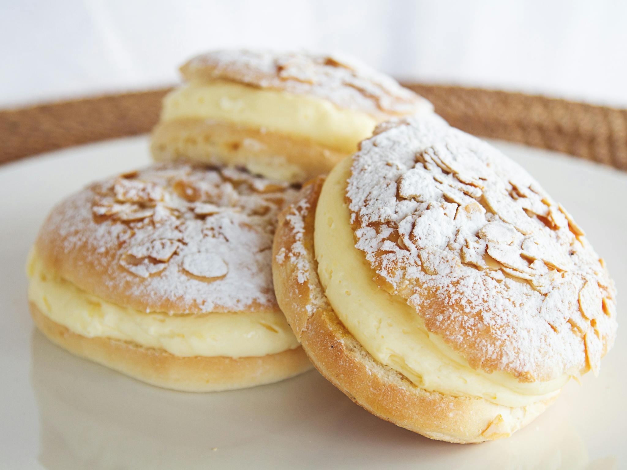 Beestings - soft sweet bun filled with velvety custard and topped with toffeed almonds