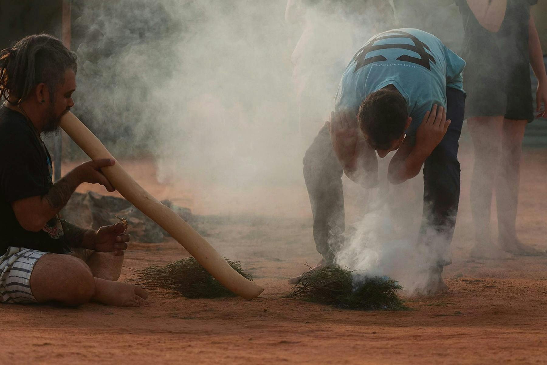 Participate in a Smoking Ceremony