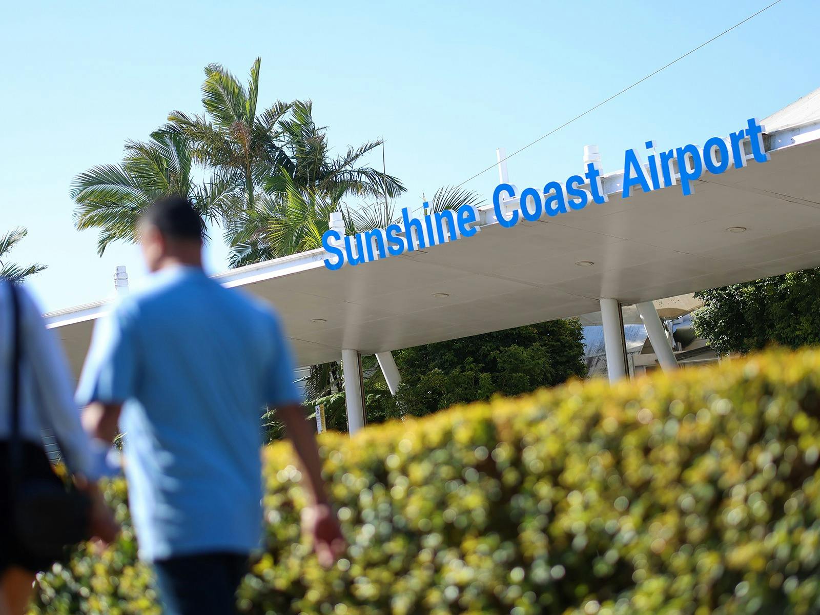 Photo of Sunshine Coast Airport sign in front of the terminal