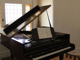 Grand piano in front room