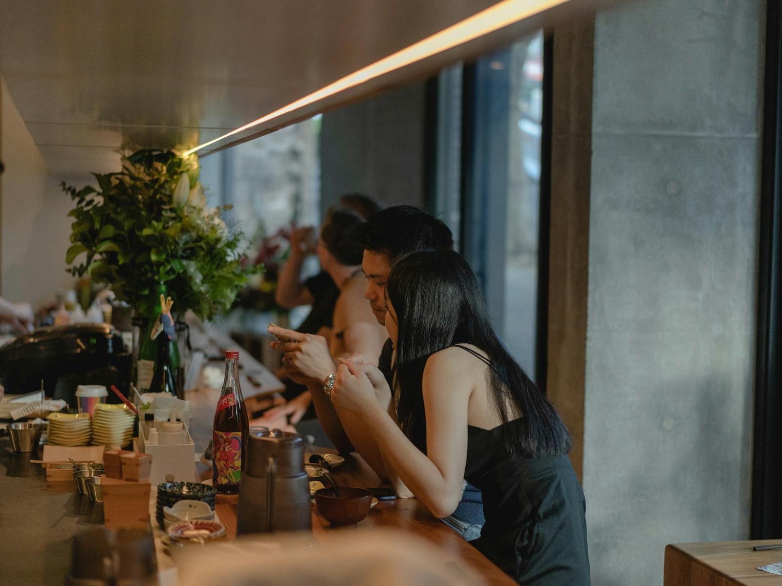 Two people dining at Amuro