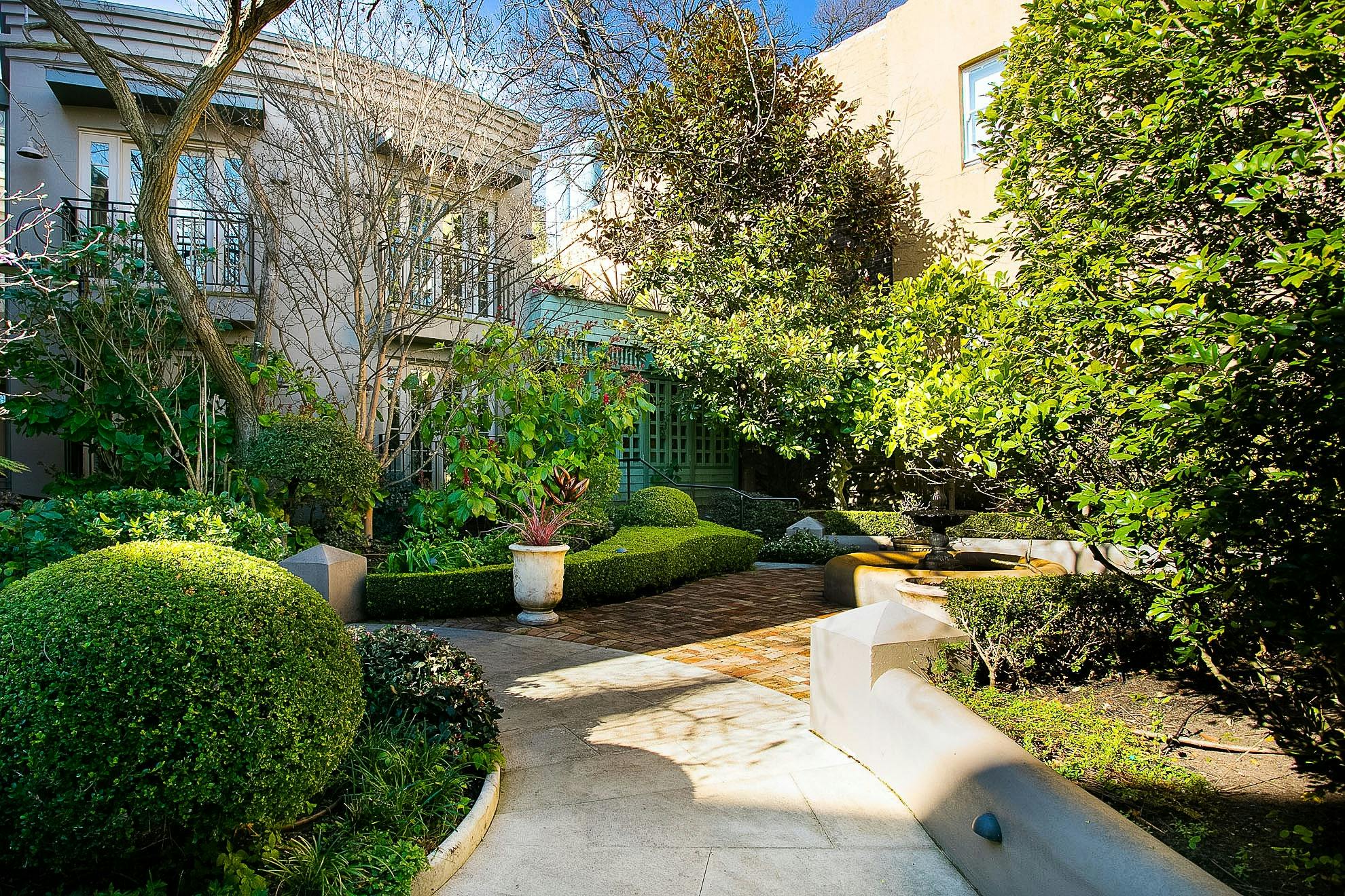 Manicured courtyard and historic fountain