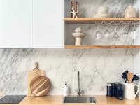 Coastal styled kitchen with pale oak timber benchtop and shelving