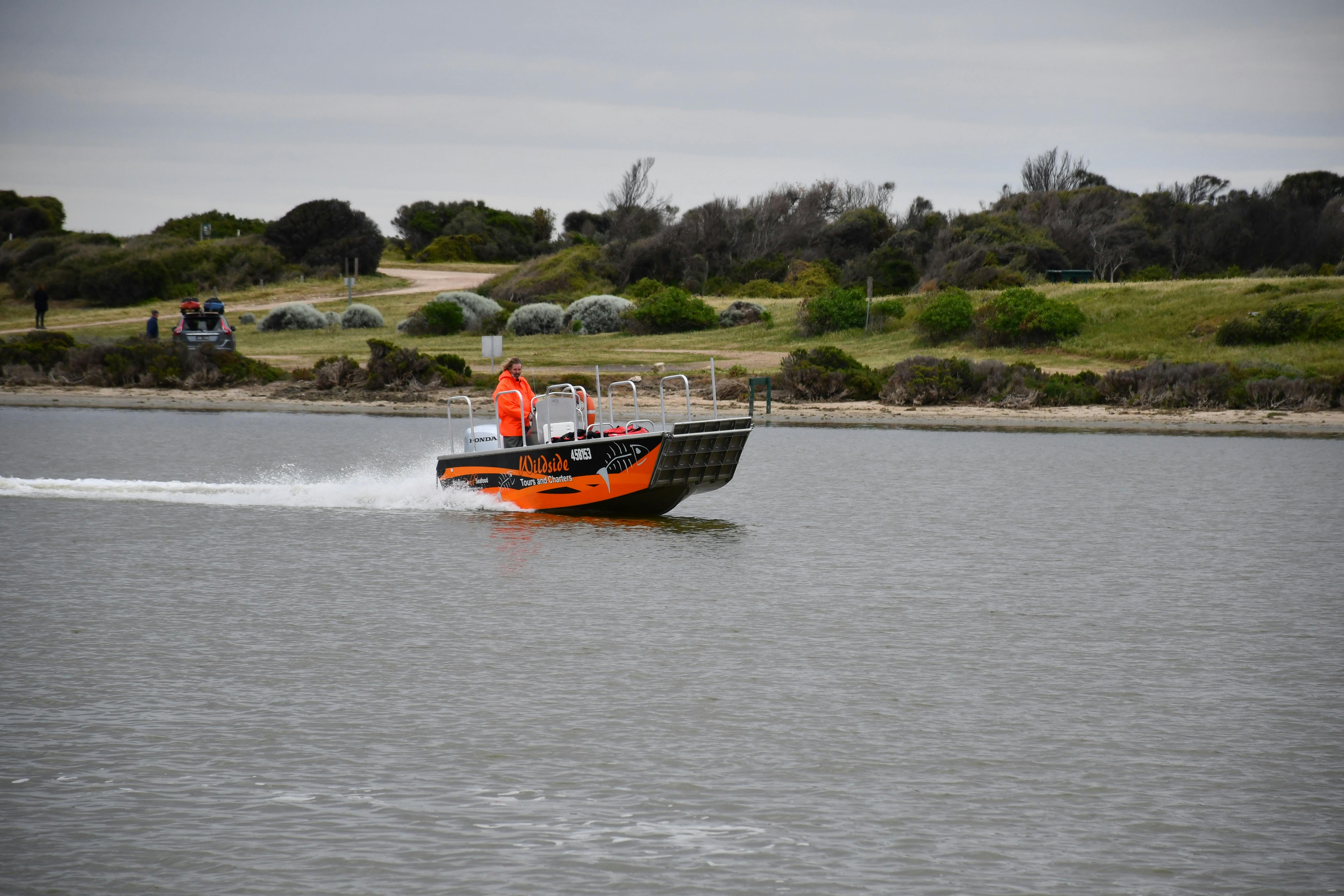 Glen Hill and boat taking tourists from Parnka Point to sandhills walk