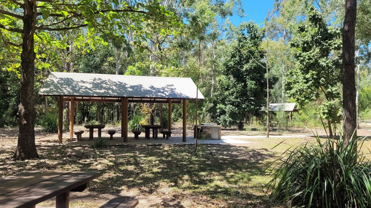 Sheltered picnic tables and barbecue Sheltered picnic tables and barbecue