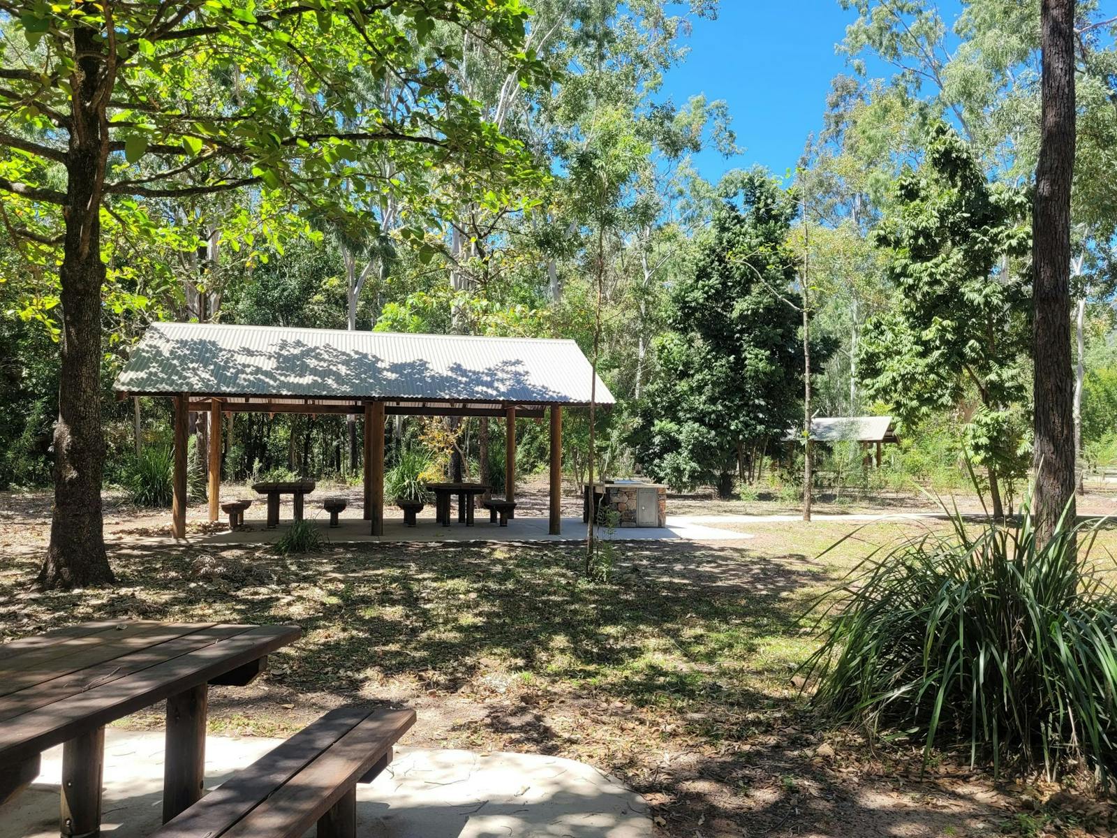 Sheltered picnic tables and barbecue