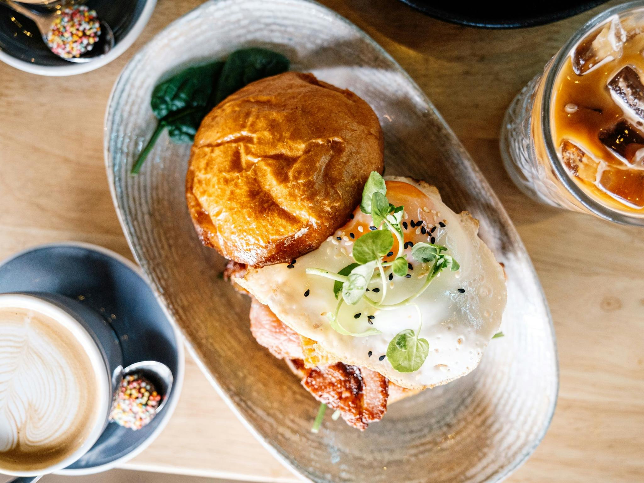 bacon | egg | spinach | housemade hash | bbq sauce | toasted bun | bacon | egg | spinach | housemade hash | bbq sauce | toasted bun |