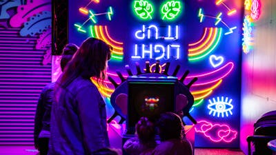 Children enjoying the Illuminate exhibition