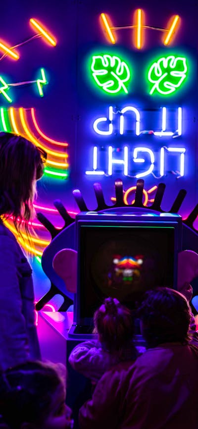 Children enjoying the Illuminate exhibition