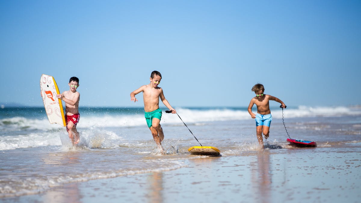 Kids playing at Woorim Beach, Bribie Island