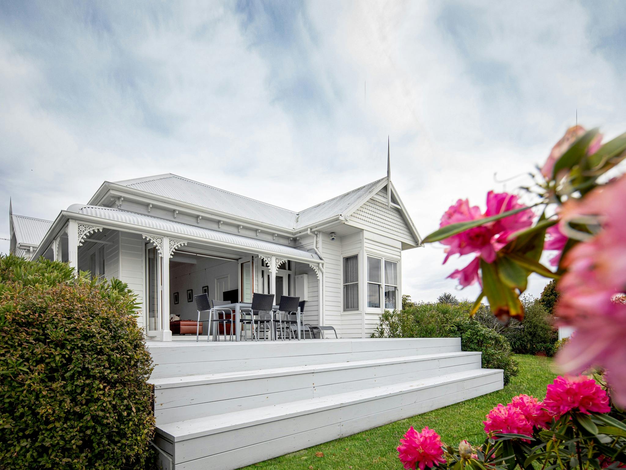 Bridport Beach House and deck view from garden