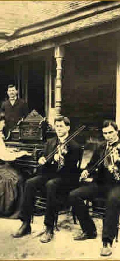 Black and white image of olden days group of musicians