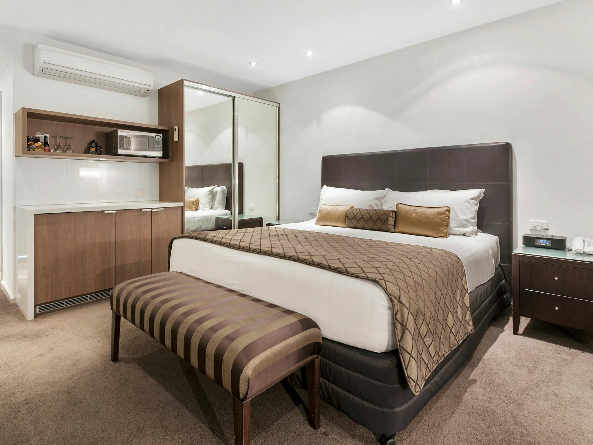 The Gateway's King Suites offer a comfortable spacious room with balcony & natural light