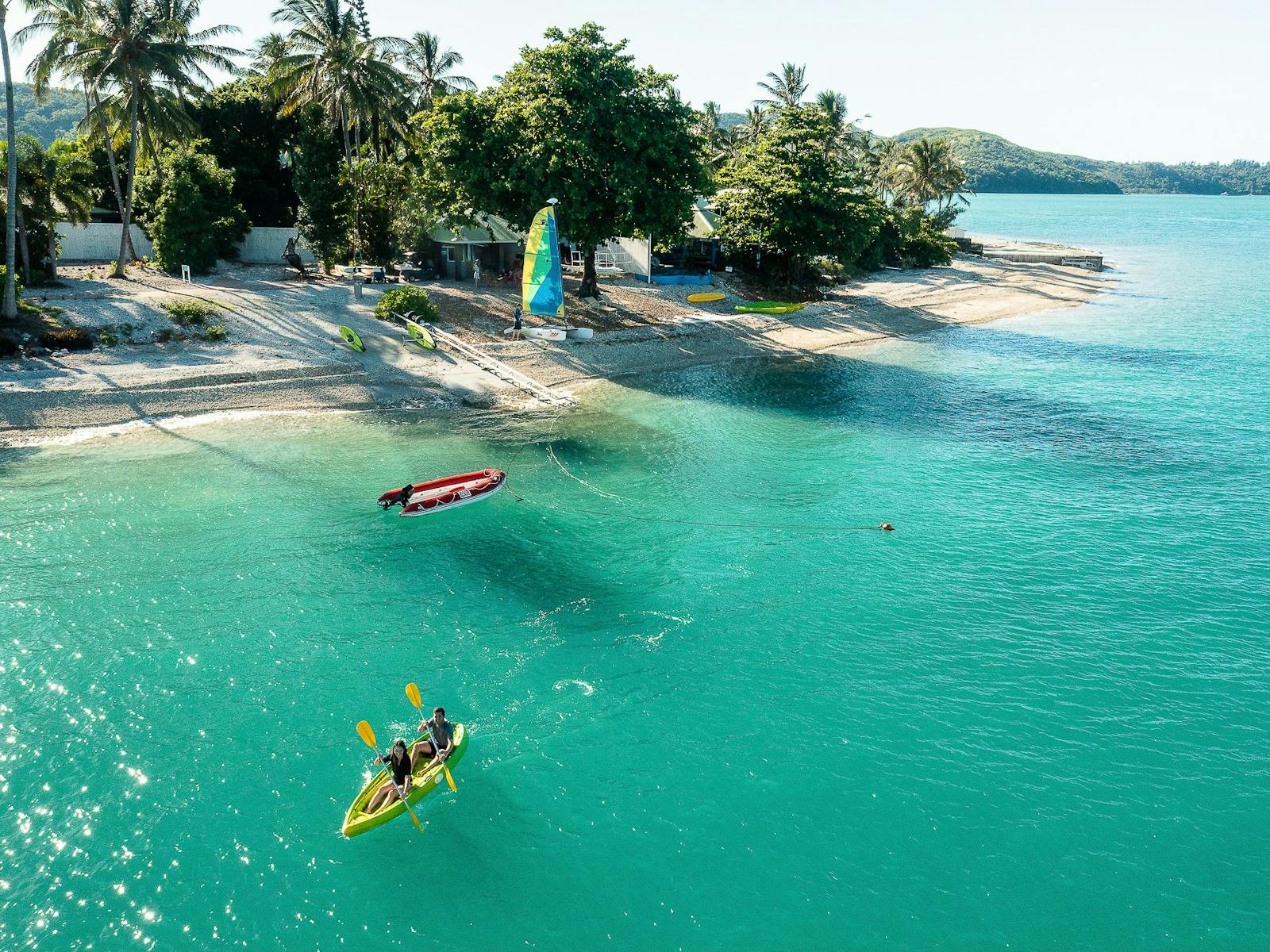 Two people kayaking off Daydream Island.