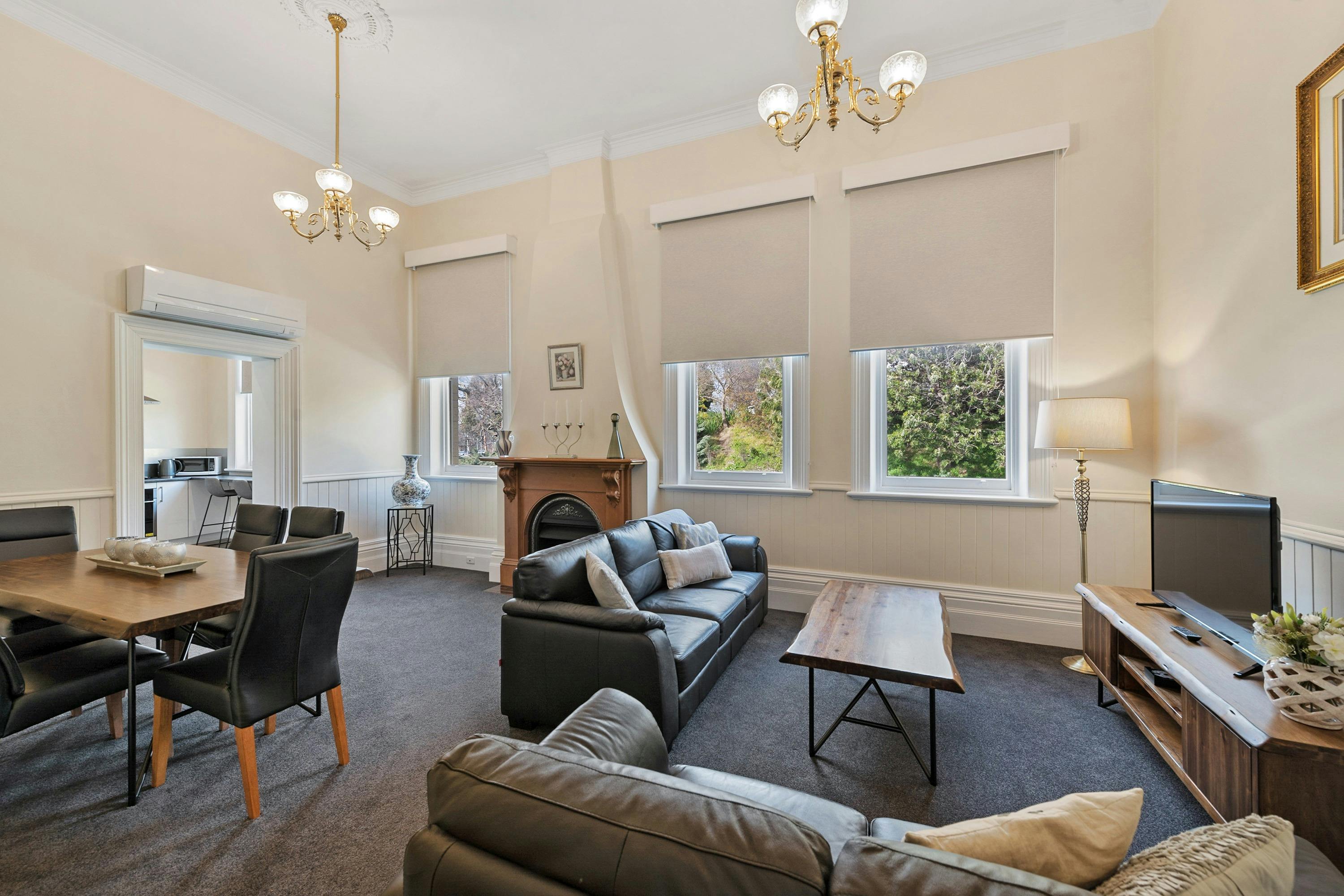 Three Bedroom Apartment living area, dining room and fully equipped kitchen and laundry.