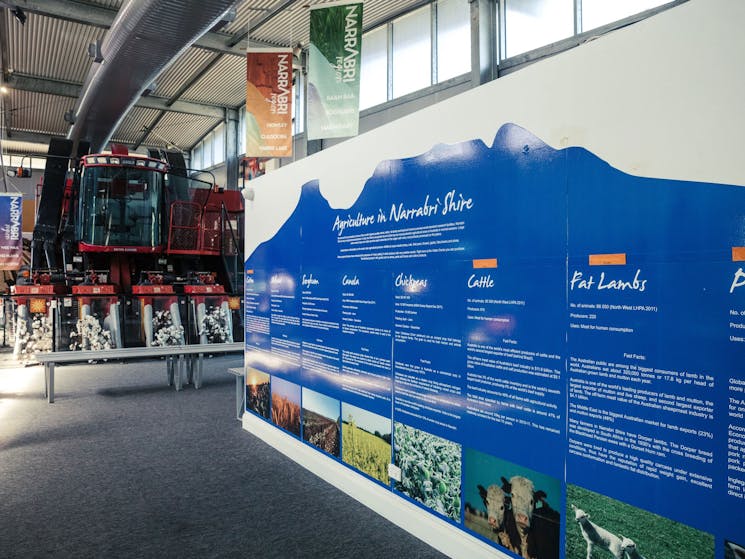 Inside of Narrabri Region Visitor Information Centre showcasing red cotton picker
