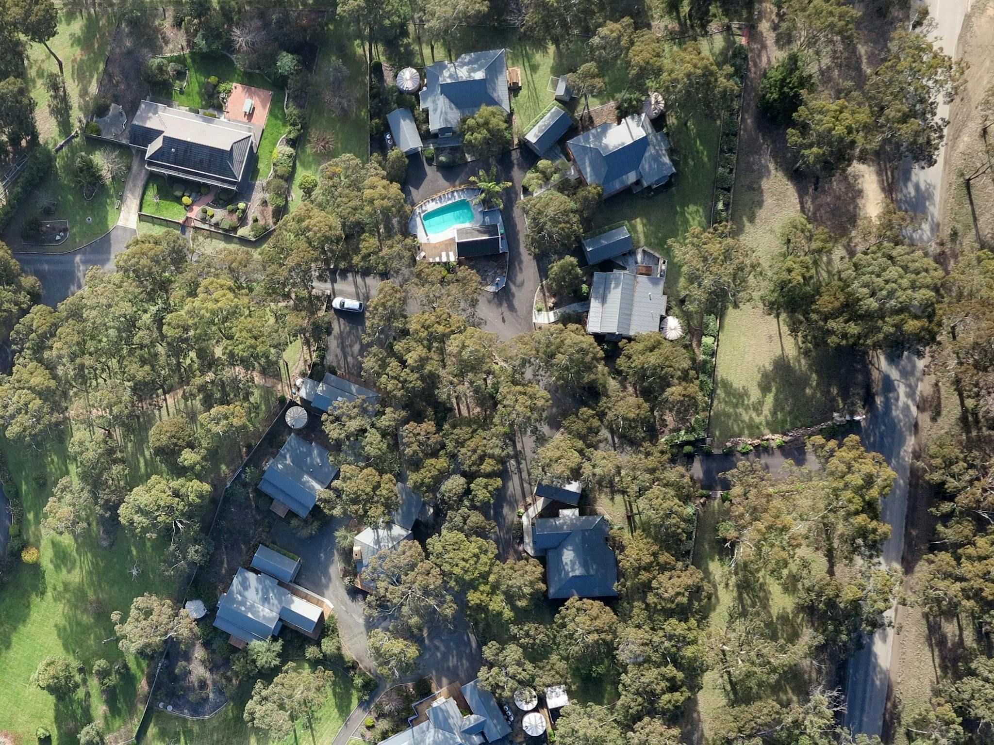 Aerial view - landscape, cottages and pool