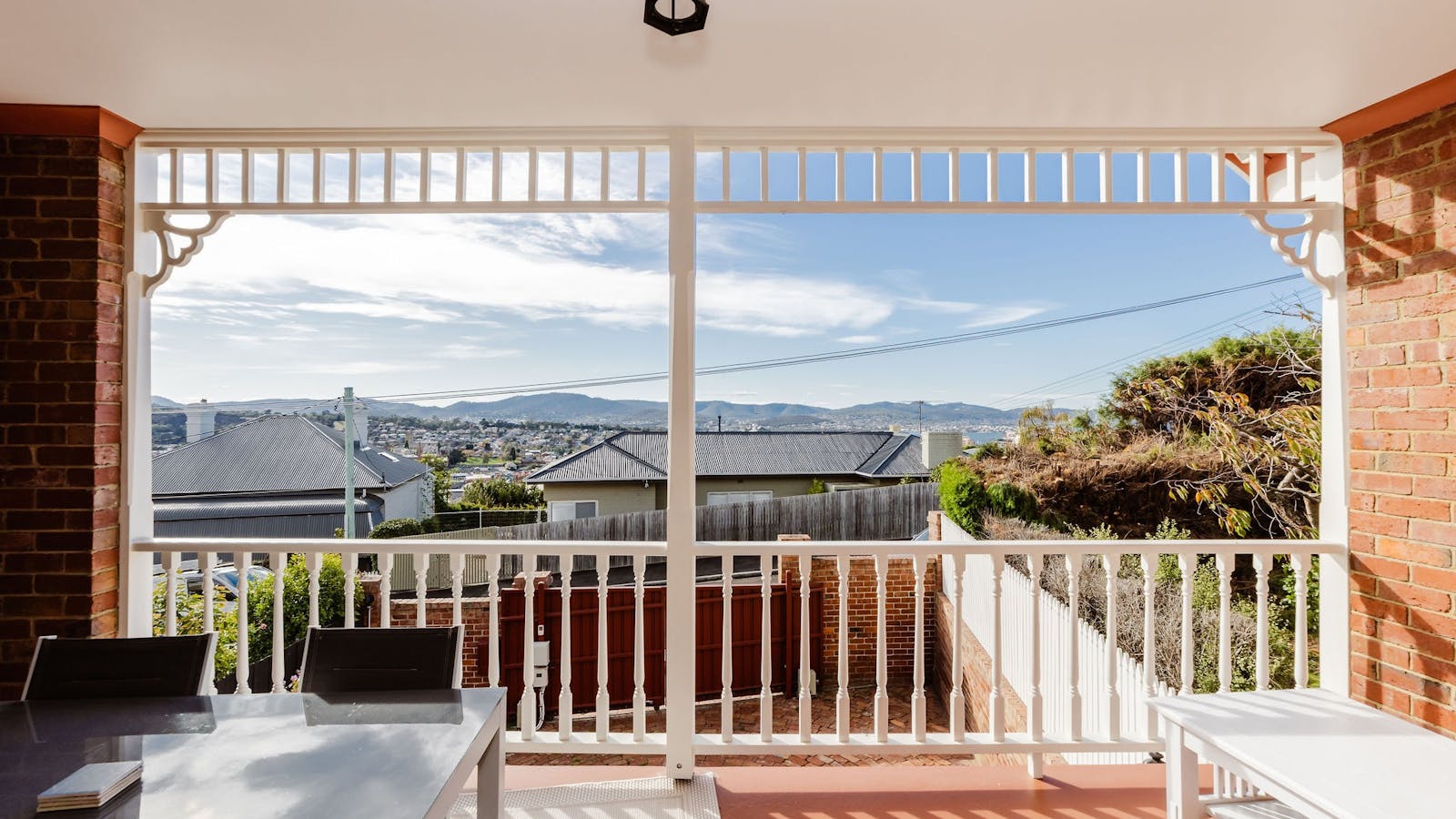 View of Hobart City with glimpses of the sea from the deck