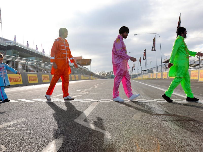 4 Beatles in Sgt Peppers costumes cross Bathurst racing track