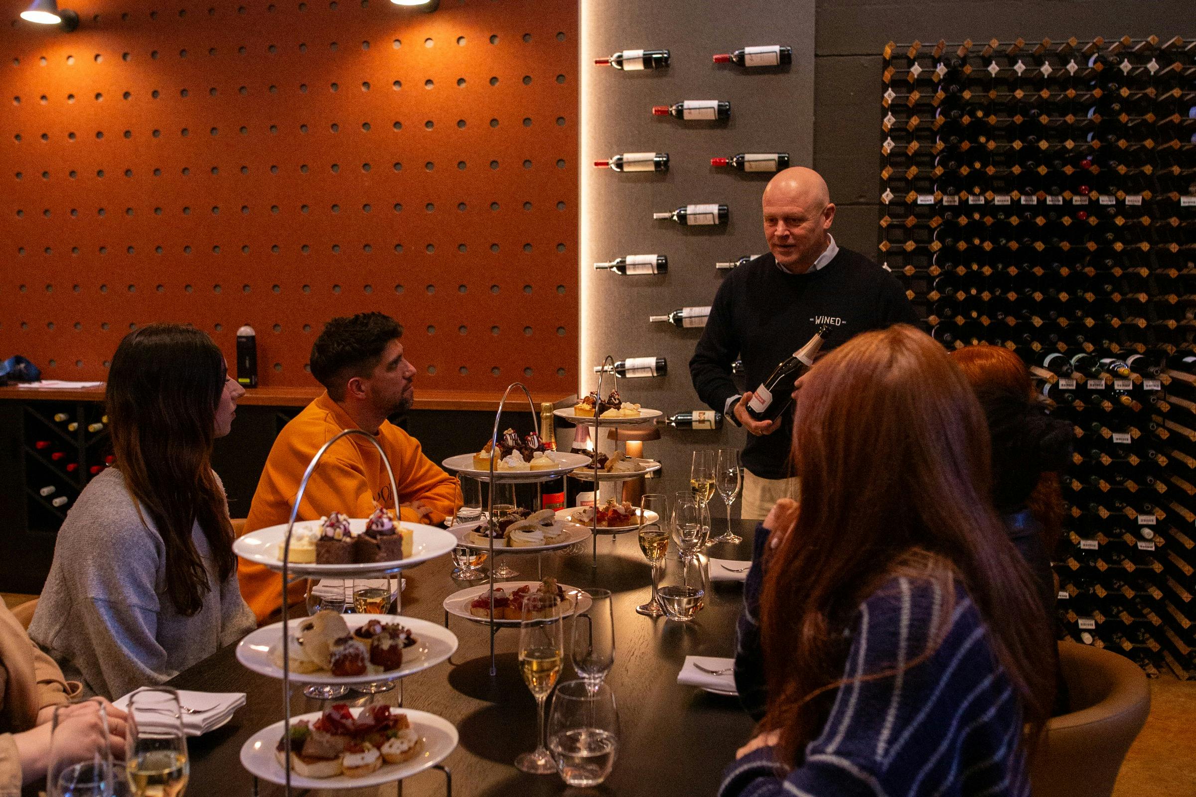 sommelier hosting high tea