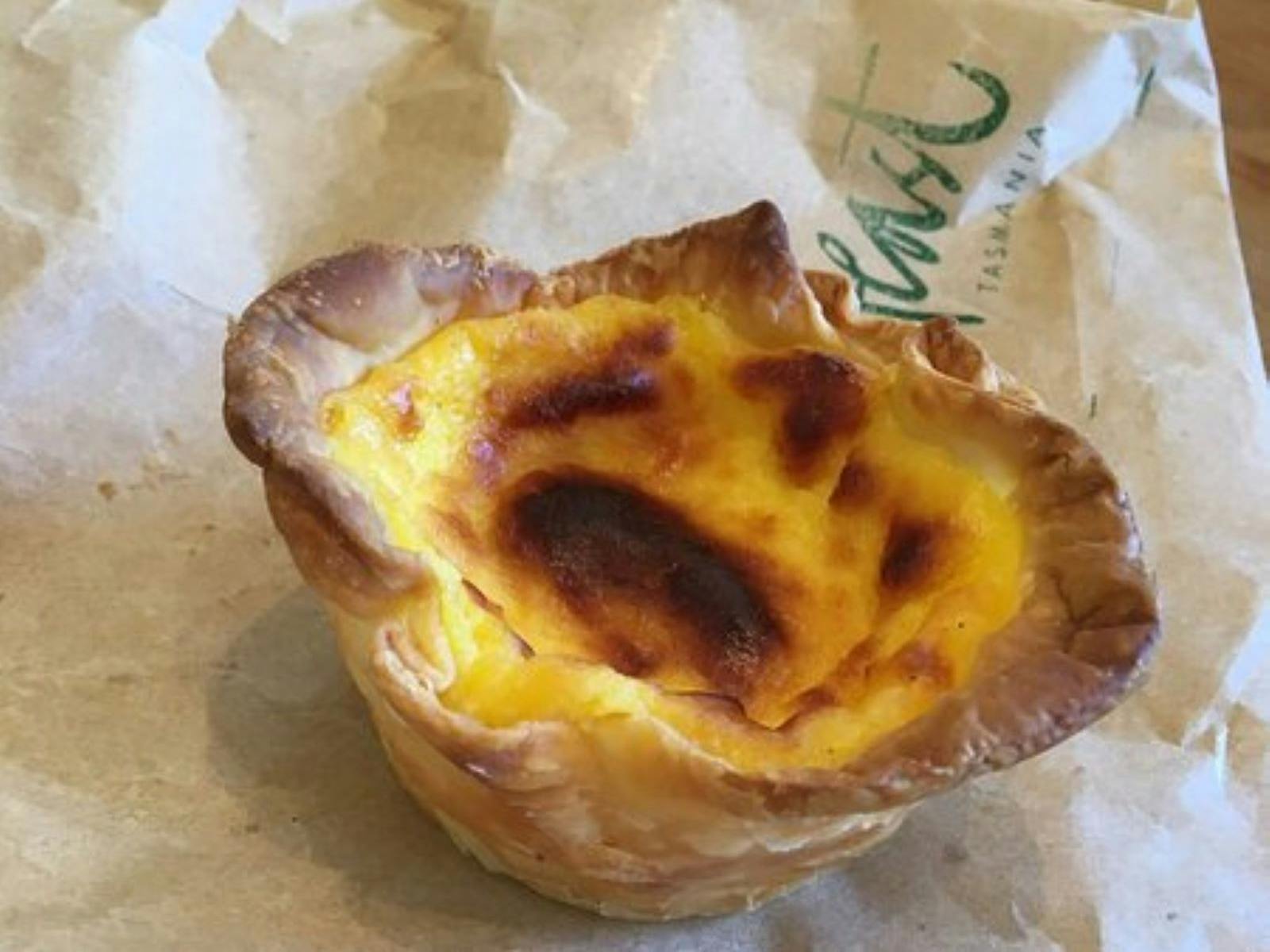 Delicious looking yellow custard Portuguese tart