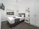 Premium family cabin large master bedroom with queen bed