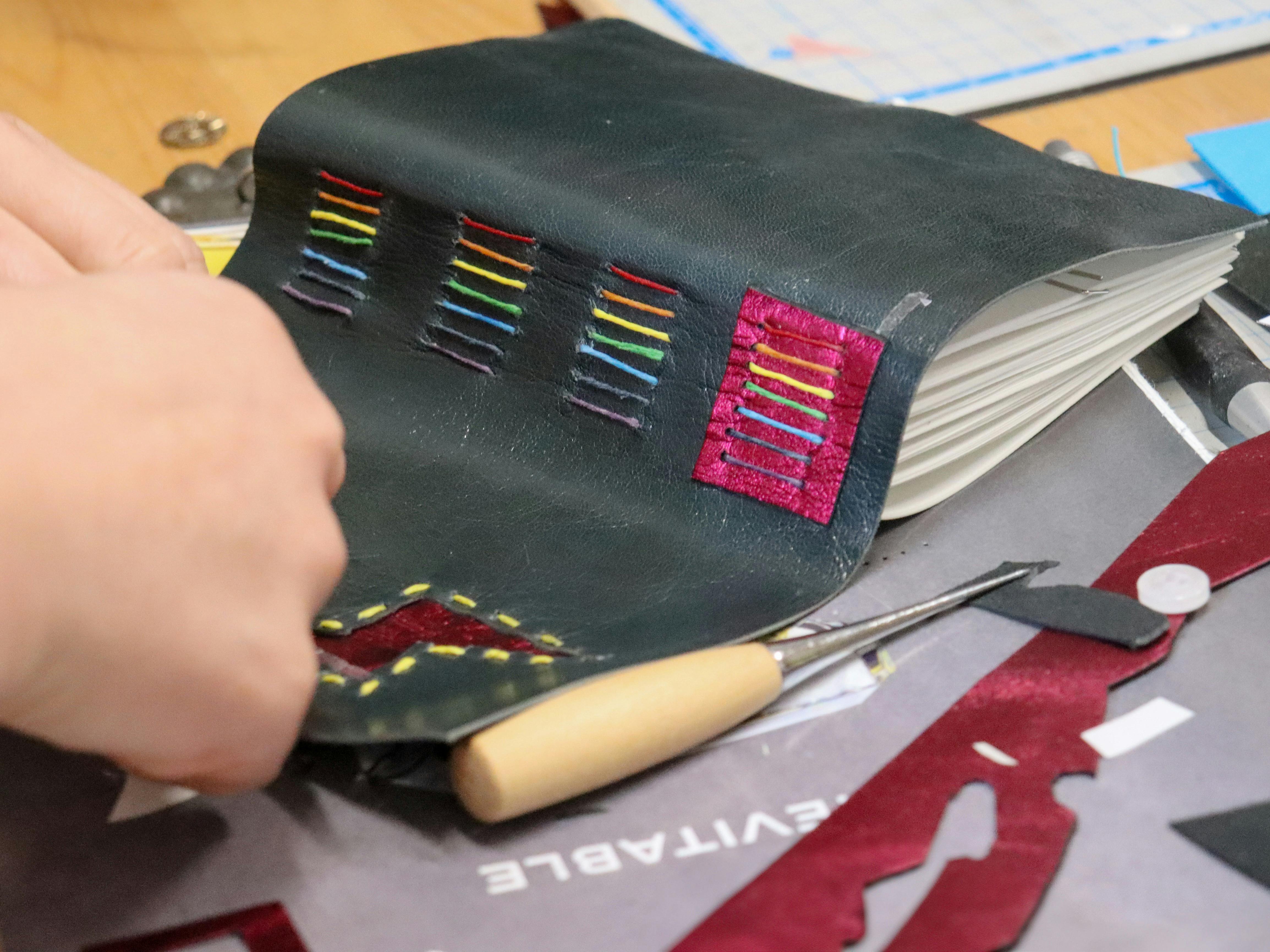 Rainbow sticked leather journal as part of the Bookbinding Workshop