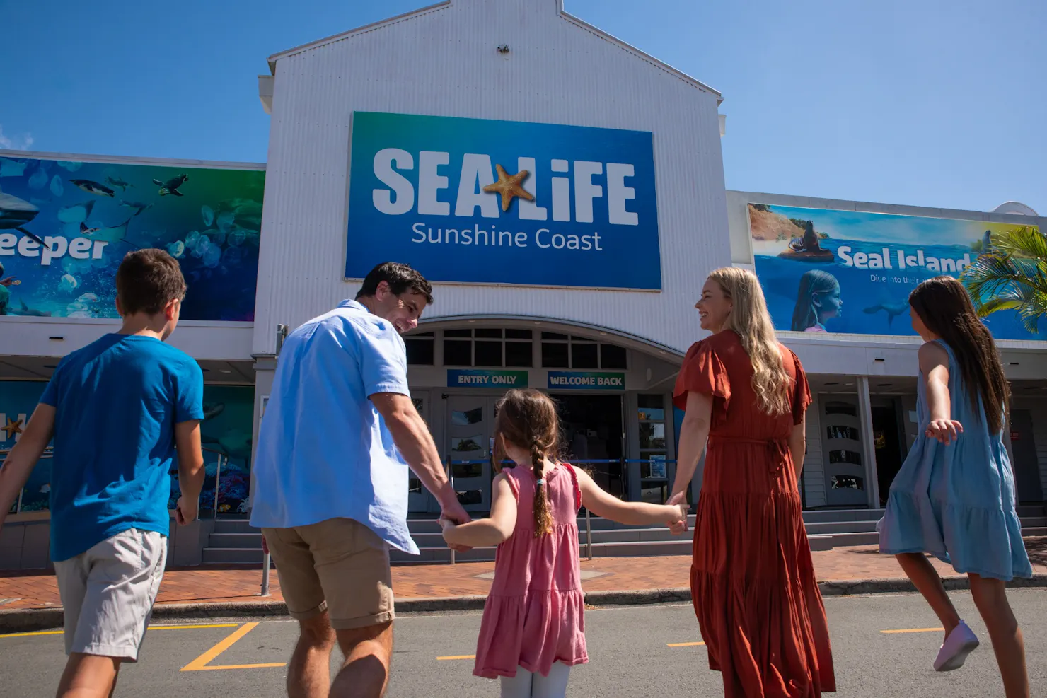 Family walking into SEA LIFE Sunshine Coast