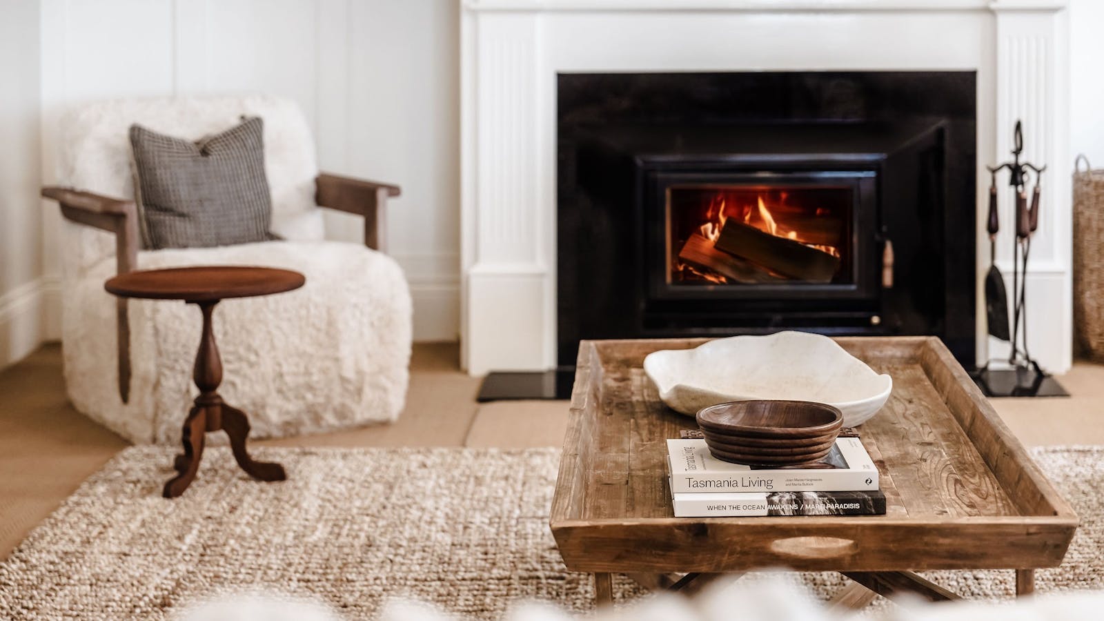 The roaring fire is a welcoming welcome to the formal living room in the colder months