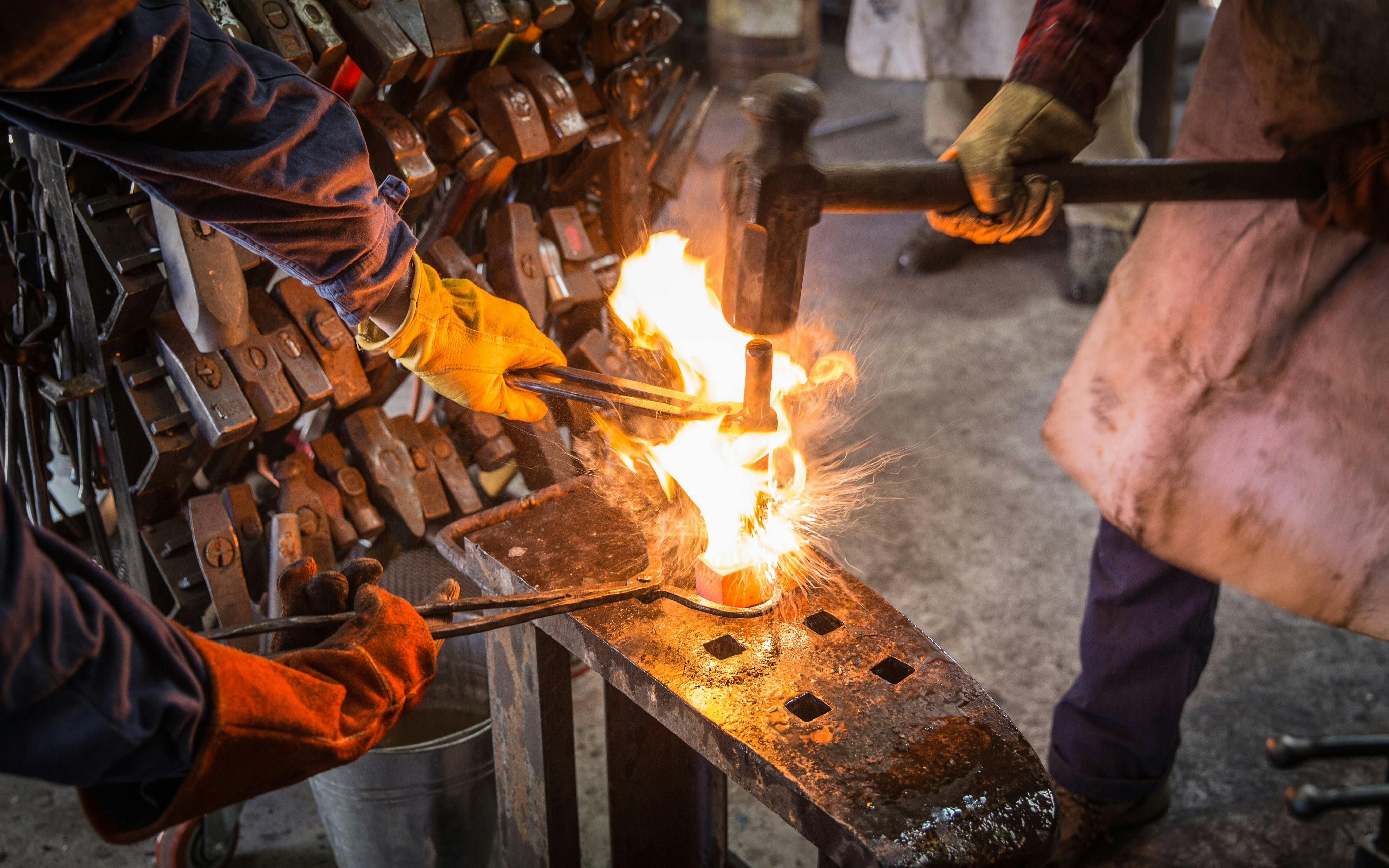 blacksmiths drifting a hammer head