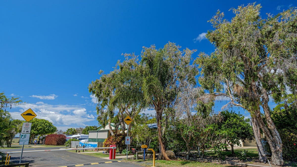 The picturesque entrance to the park provides added security with a boom gate.