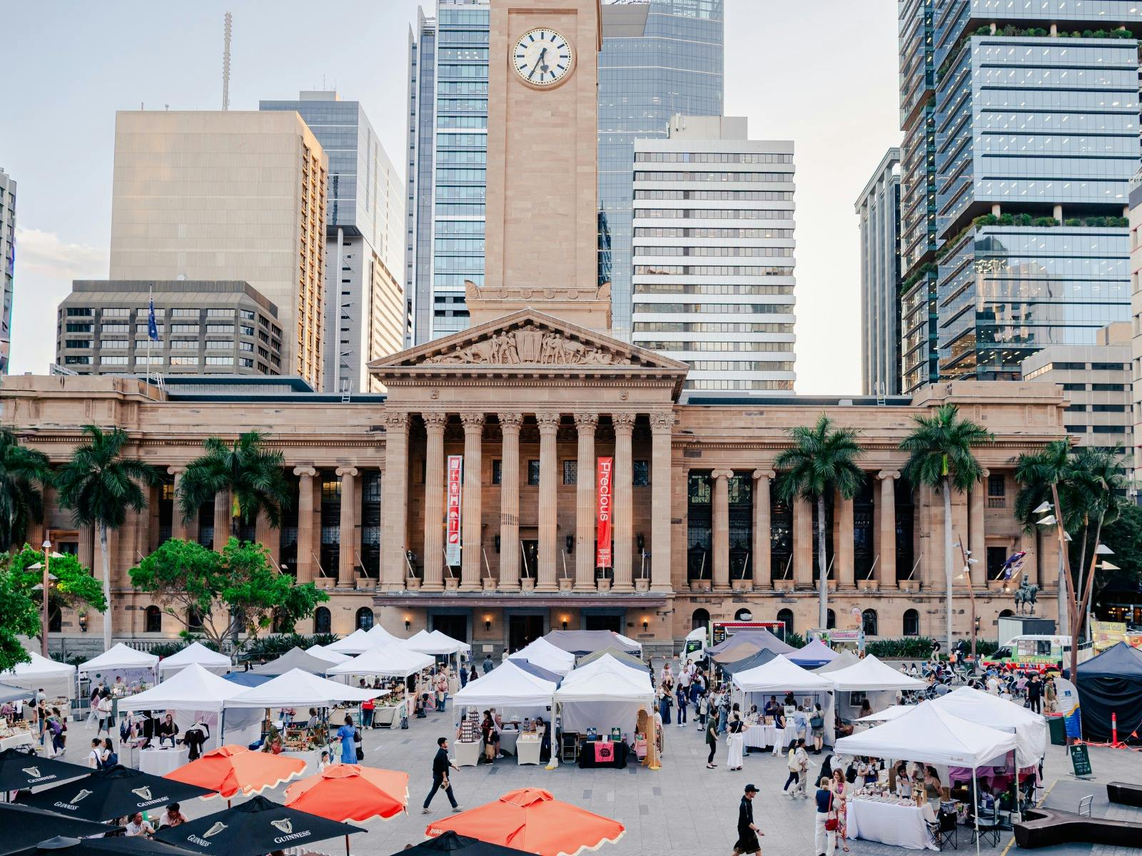 A photo showing a market set up infront of Brisbane City Hall