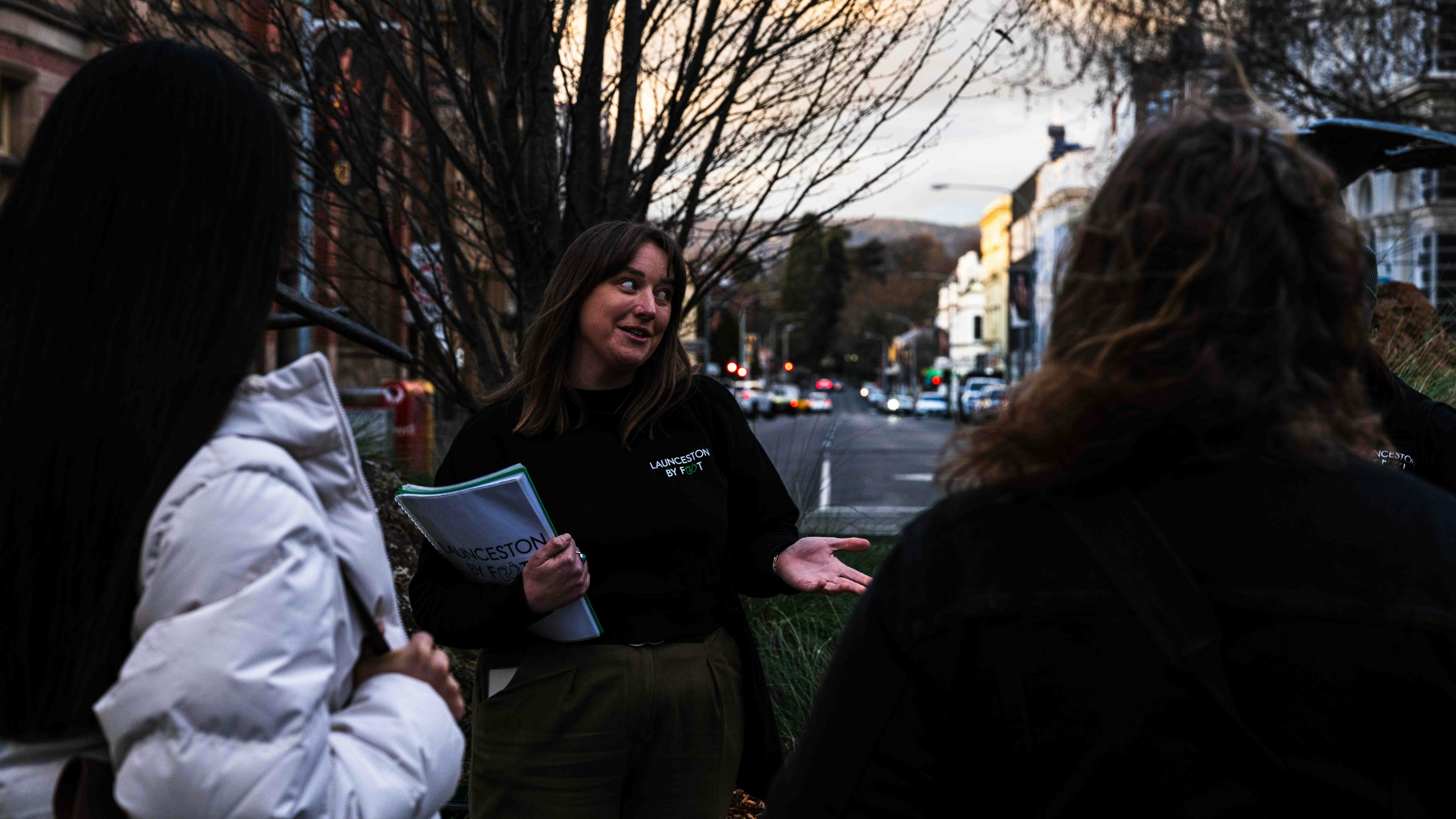 Launceston By Foot guide speaking with guests during a Dark Side of Launceston walking tour.