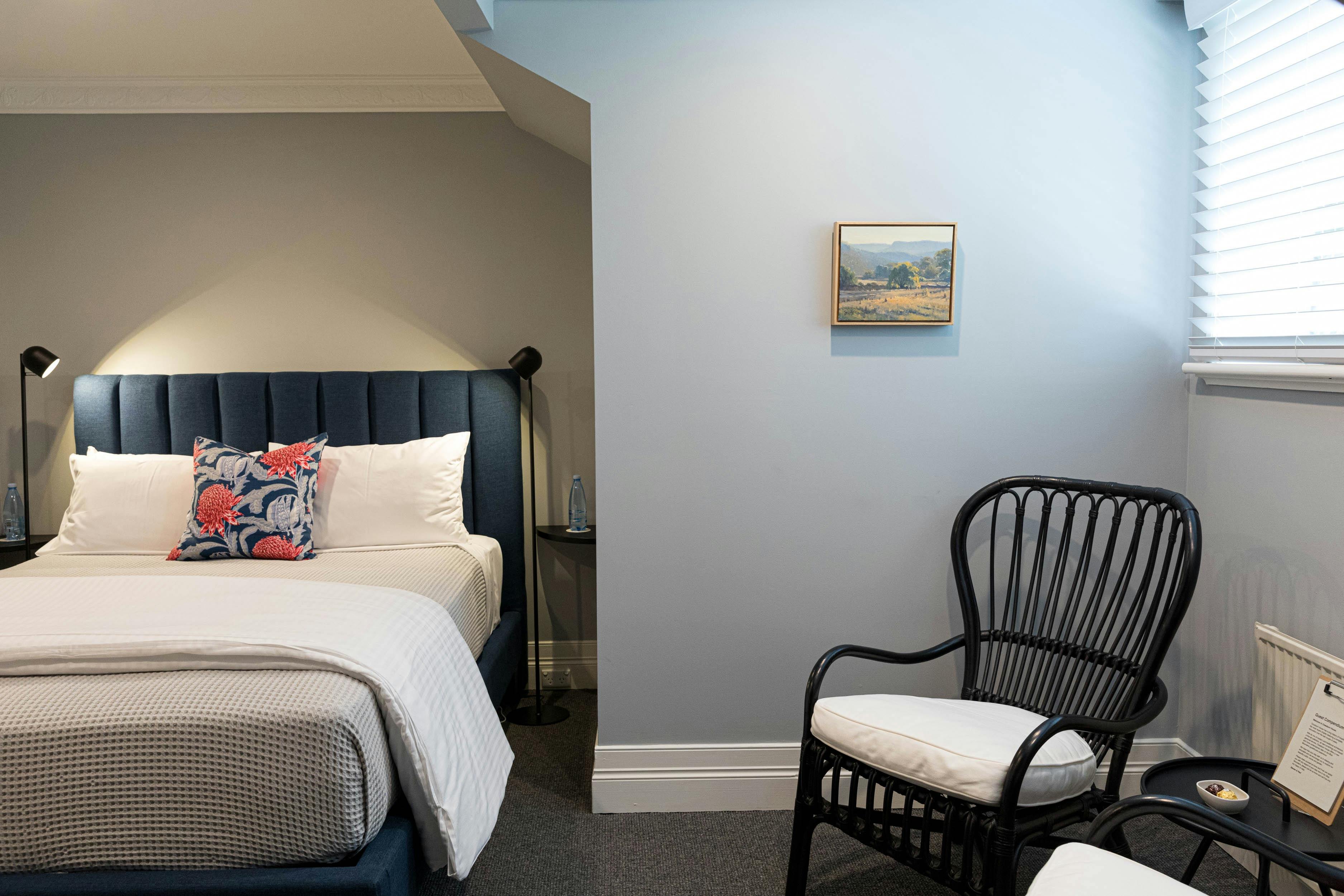 Loft suite bedroom detail with sitting area