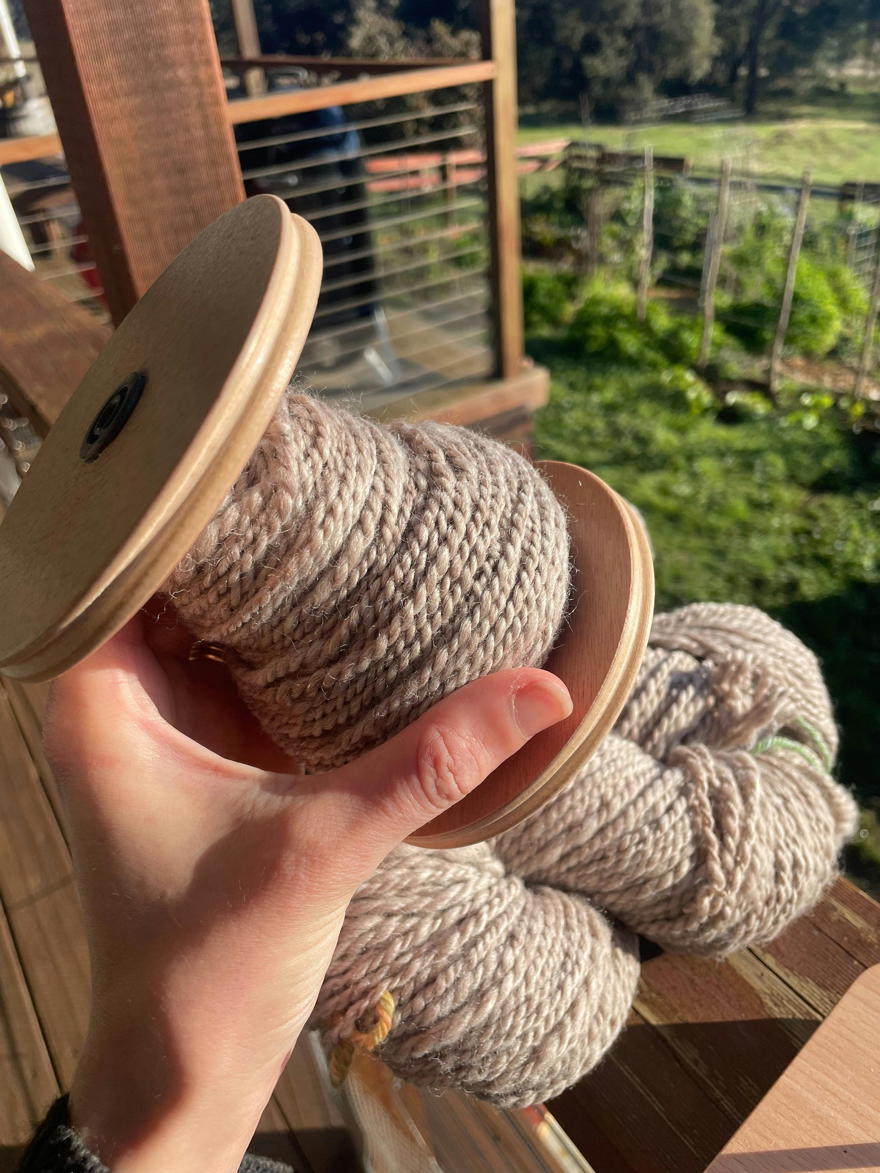 handspun wool on bobbin