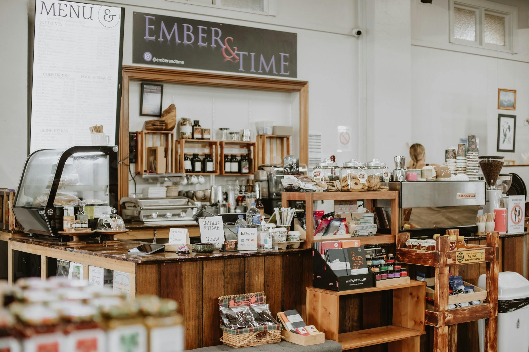 Landscape of the cafe with cakes, cookies and a selection of locally produced preserves.