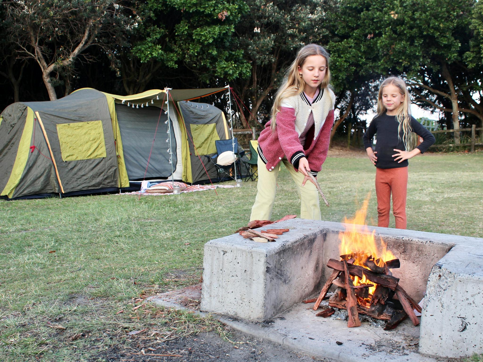 Kids around a campfire