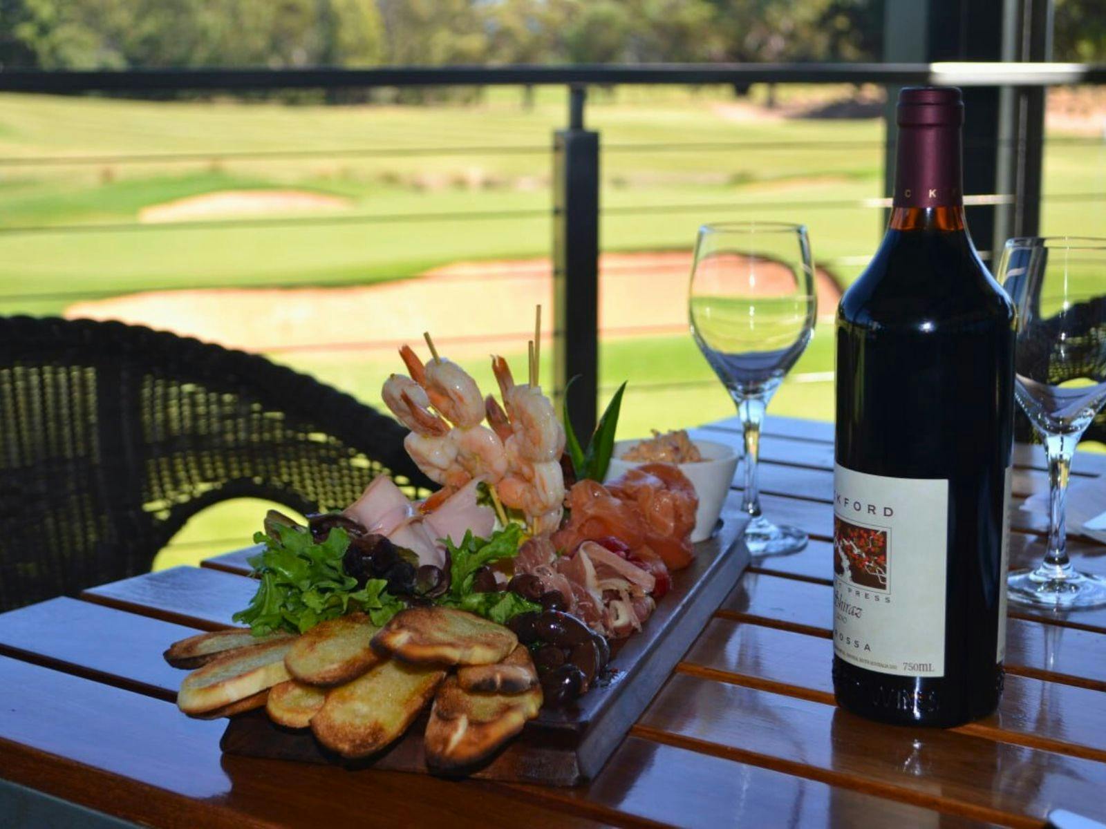 Food platter and red wine Golf Feast gourmet experience at club house