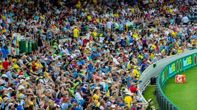 Full cricket stands during a day match