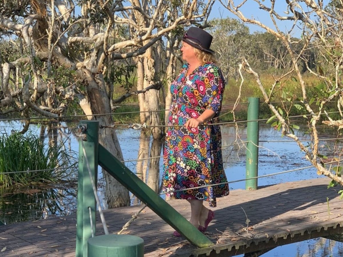 A woman in a bright dress at Abattoir Swamp in Julatten, Mareeba Shire, Tropical North Queensland