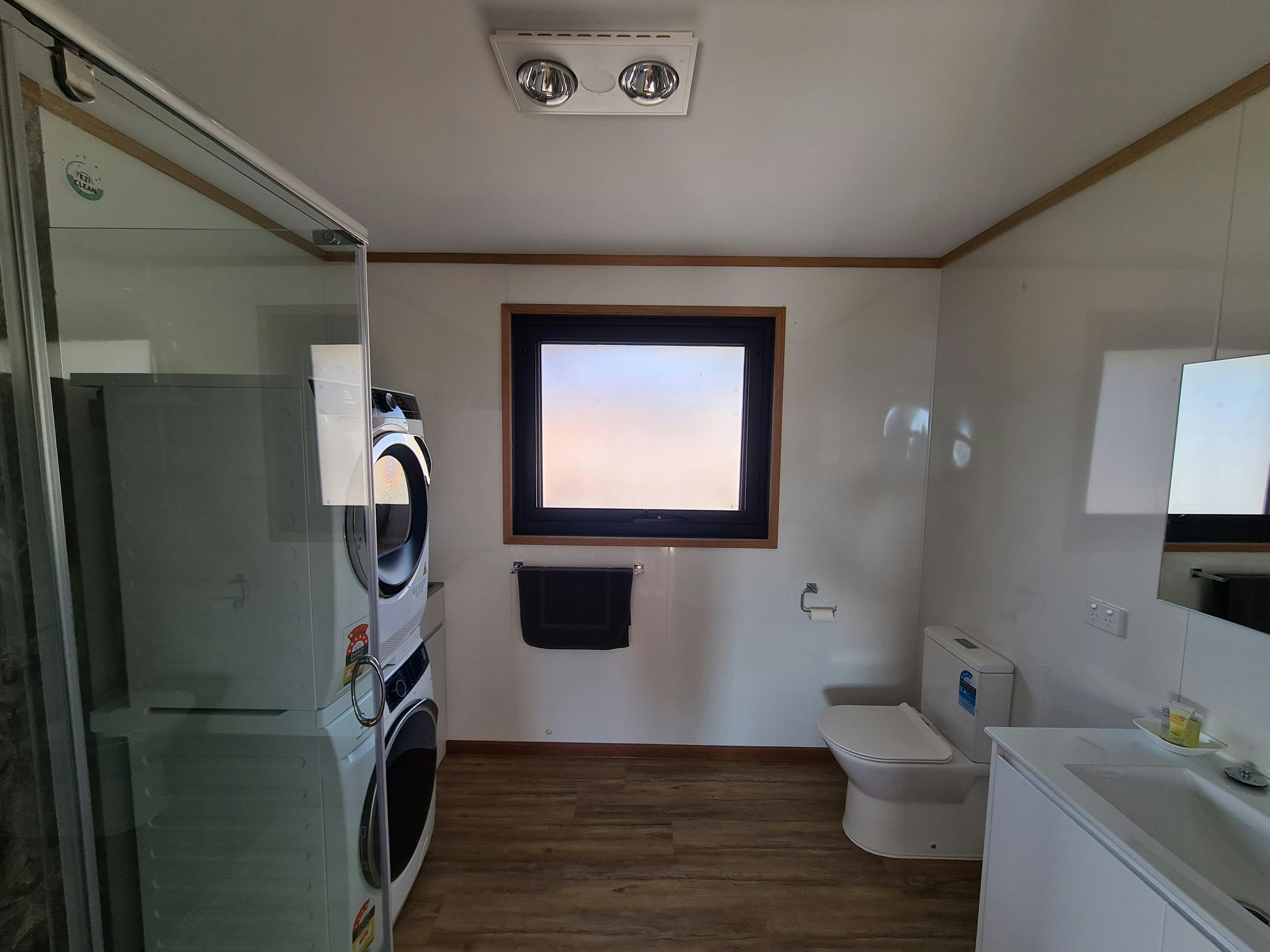 Private bathroom at Devil House with shower, vanity and toilet