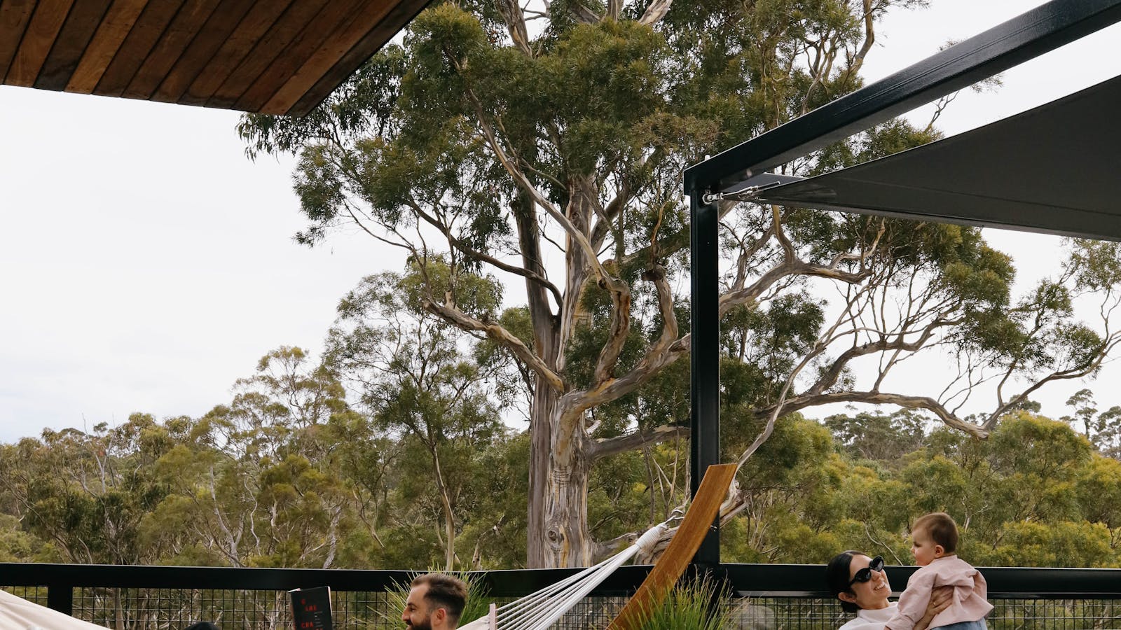 Hammock on a private deck overlooking native bushland—ideal for quiet moments or shared relaxation