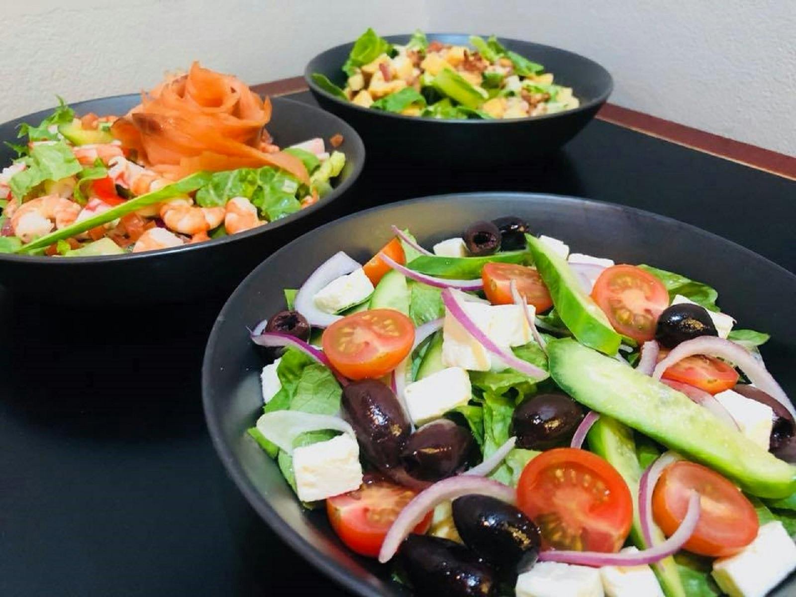 Variety of salads on display at Petite Papillons Brasserie in Campbelltown