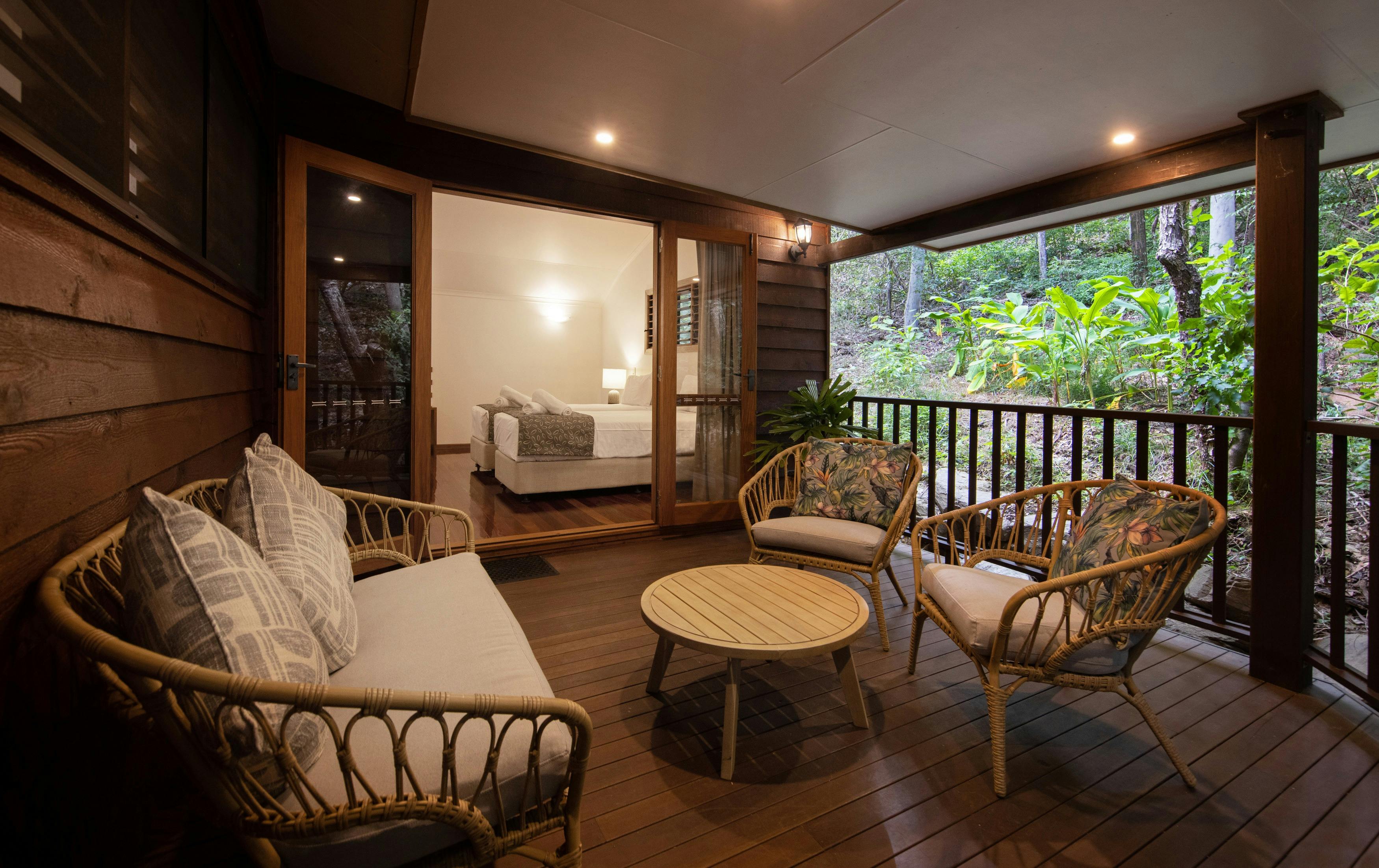 Second bedroom and outdoor dining area on balcony