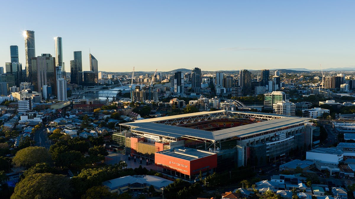 Aerial shot of Suncorp Stadium in the morning with the city in the background