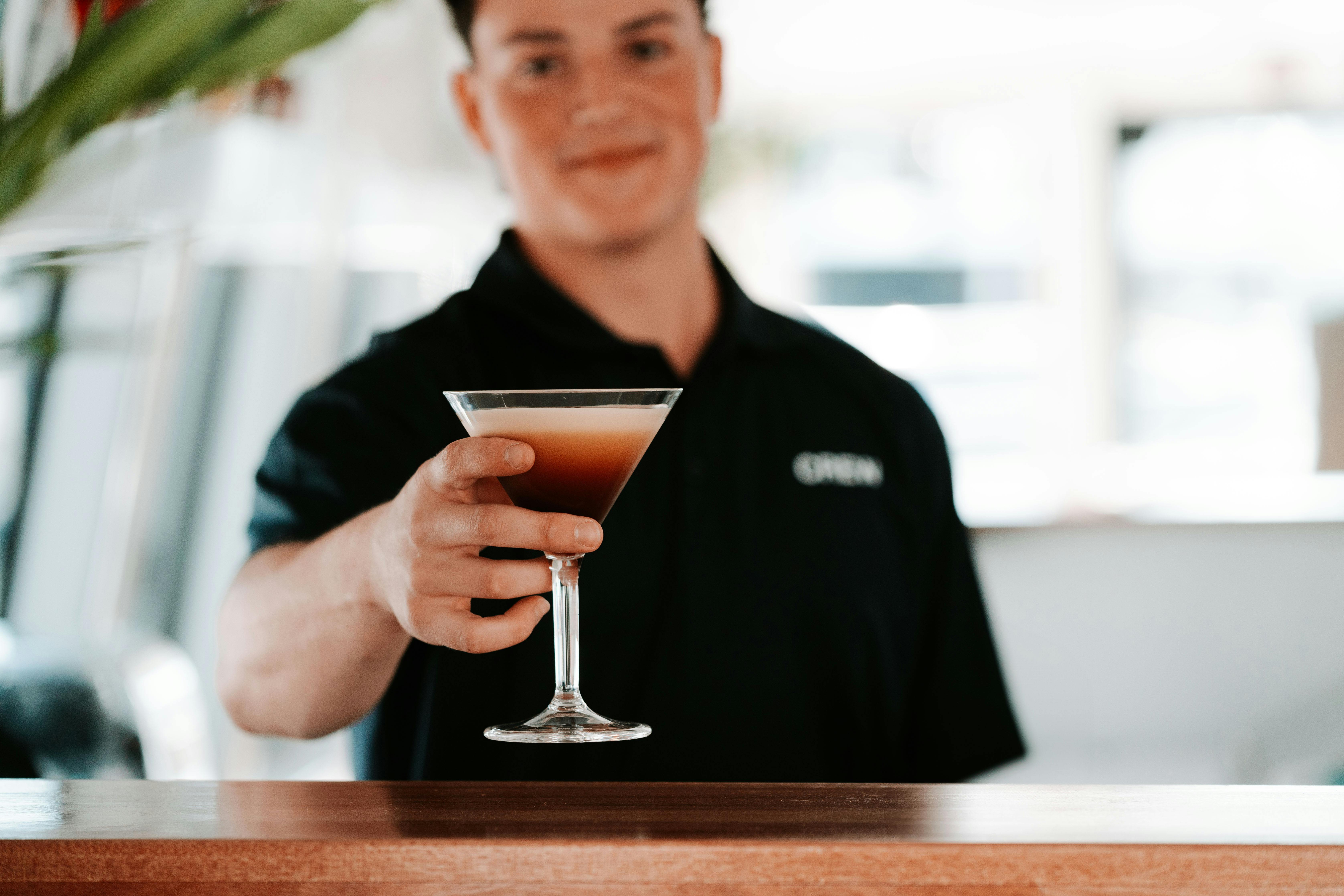 Cocktail Artist making an espresso martini onboard The Boat Mooloolaba