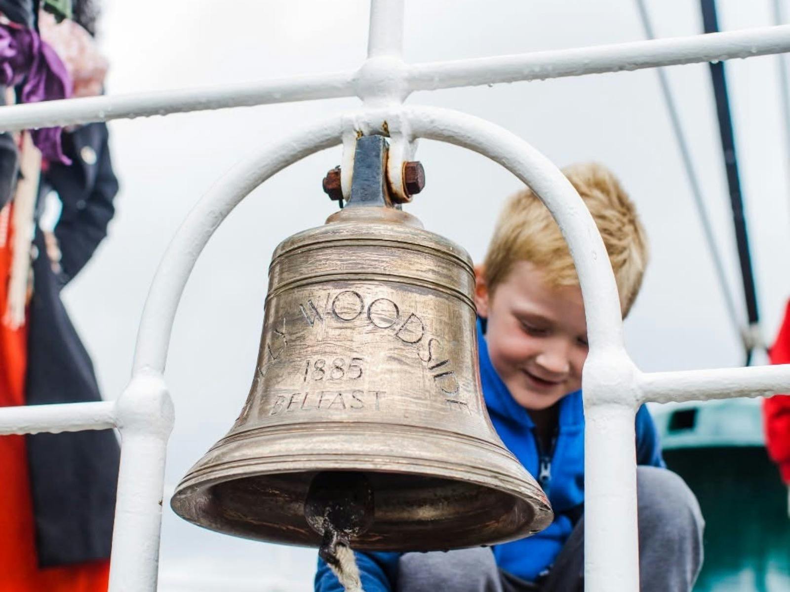Polly Woodside Pirate Day kid ringing the bell