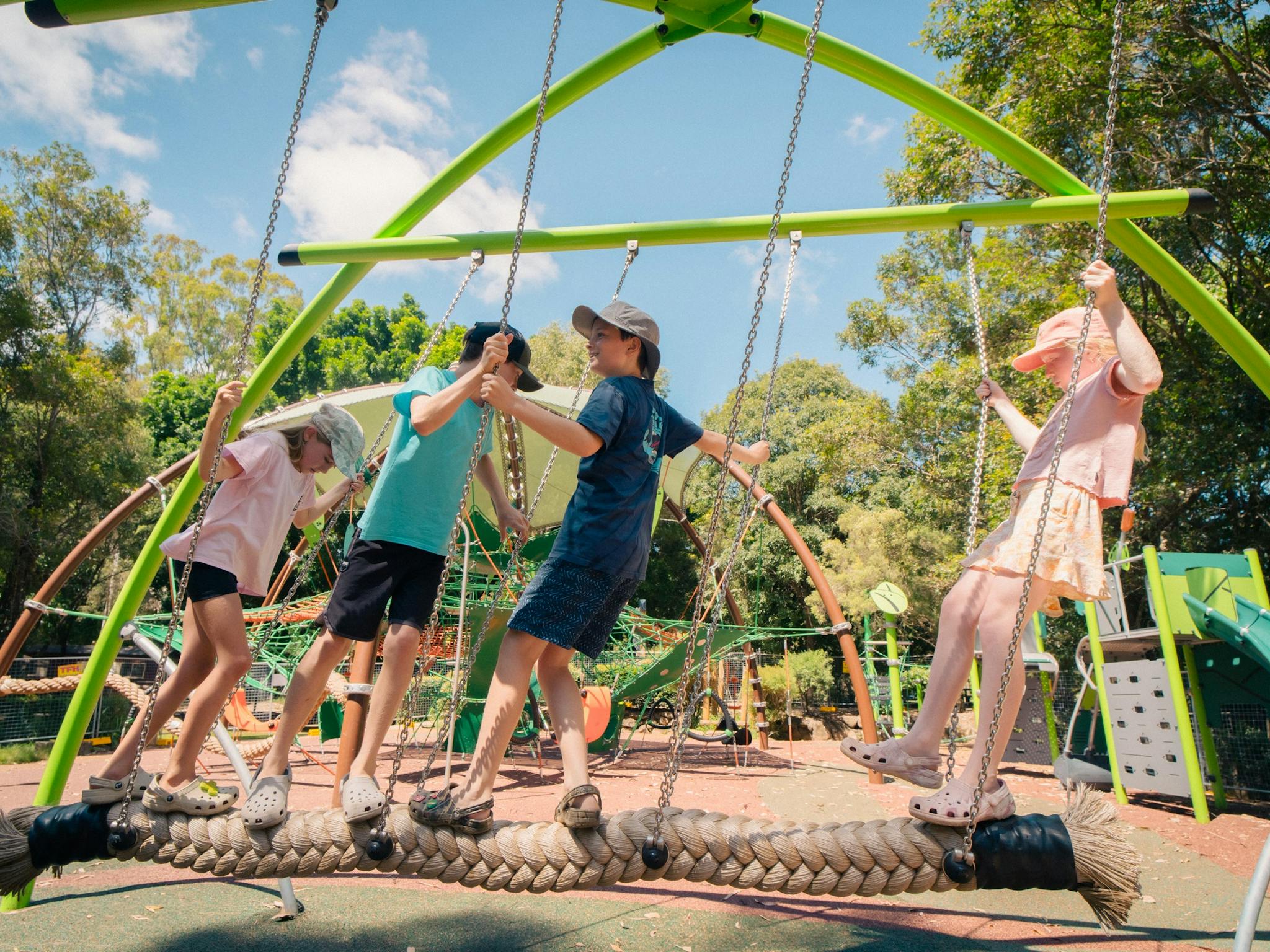 Kids swinging and having fun