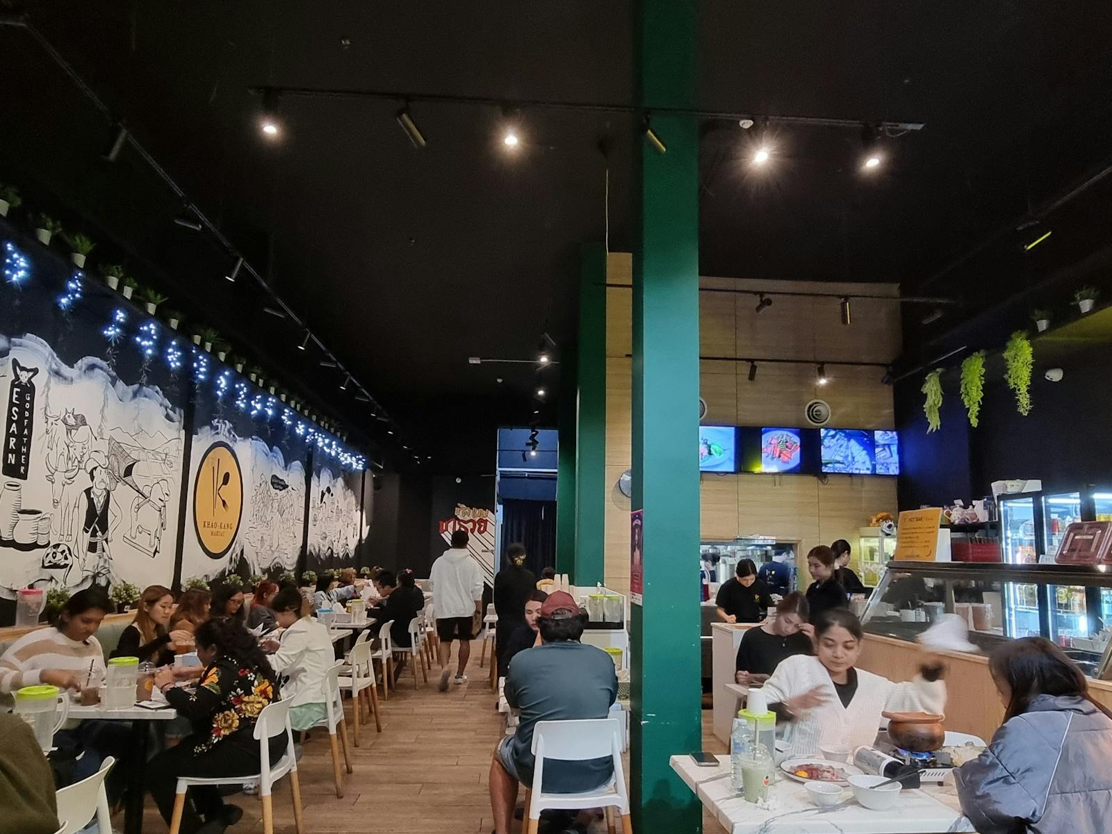 Restaurant interior with customers enjoying a meal
